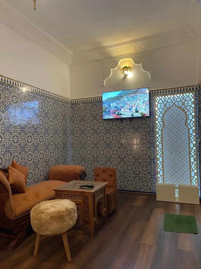 Le coin salon de la chambre Deluxe